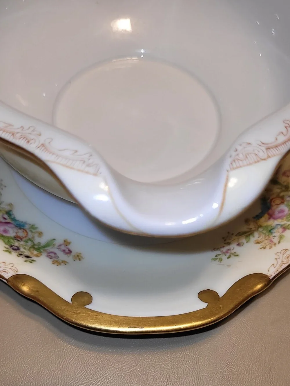 Mieto Porcelain Hand Painted Gravy Boat with Attached Saucer.